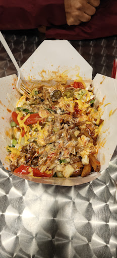 Photo of Smoke's Poutinerie St. John's - 165 Water St, St. John's, NL A1C 1A8